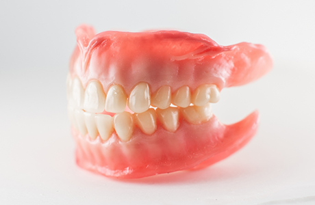 Full dentures against a white background