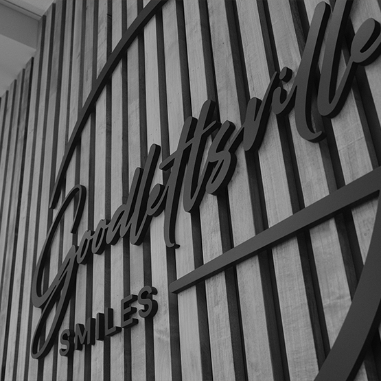 Goodlettsville Smiles sign on a wall