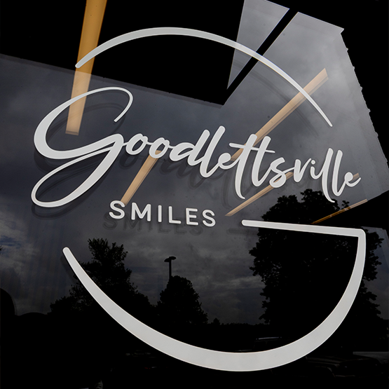 Goodlettsville Smiles logo on the front door of dental office in Goodlettsville