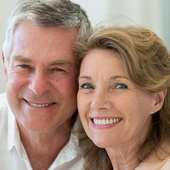 Senior man and woman smiling together with dentures in Goodlettsville