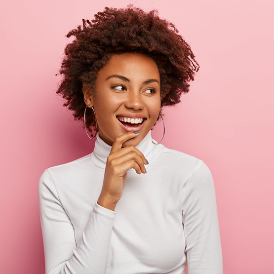 Woman smiling with flawless teeth after teeth whitening in Goodlettsville