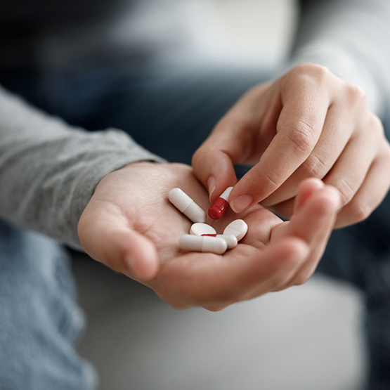 Person taking a pill
